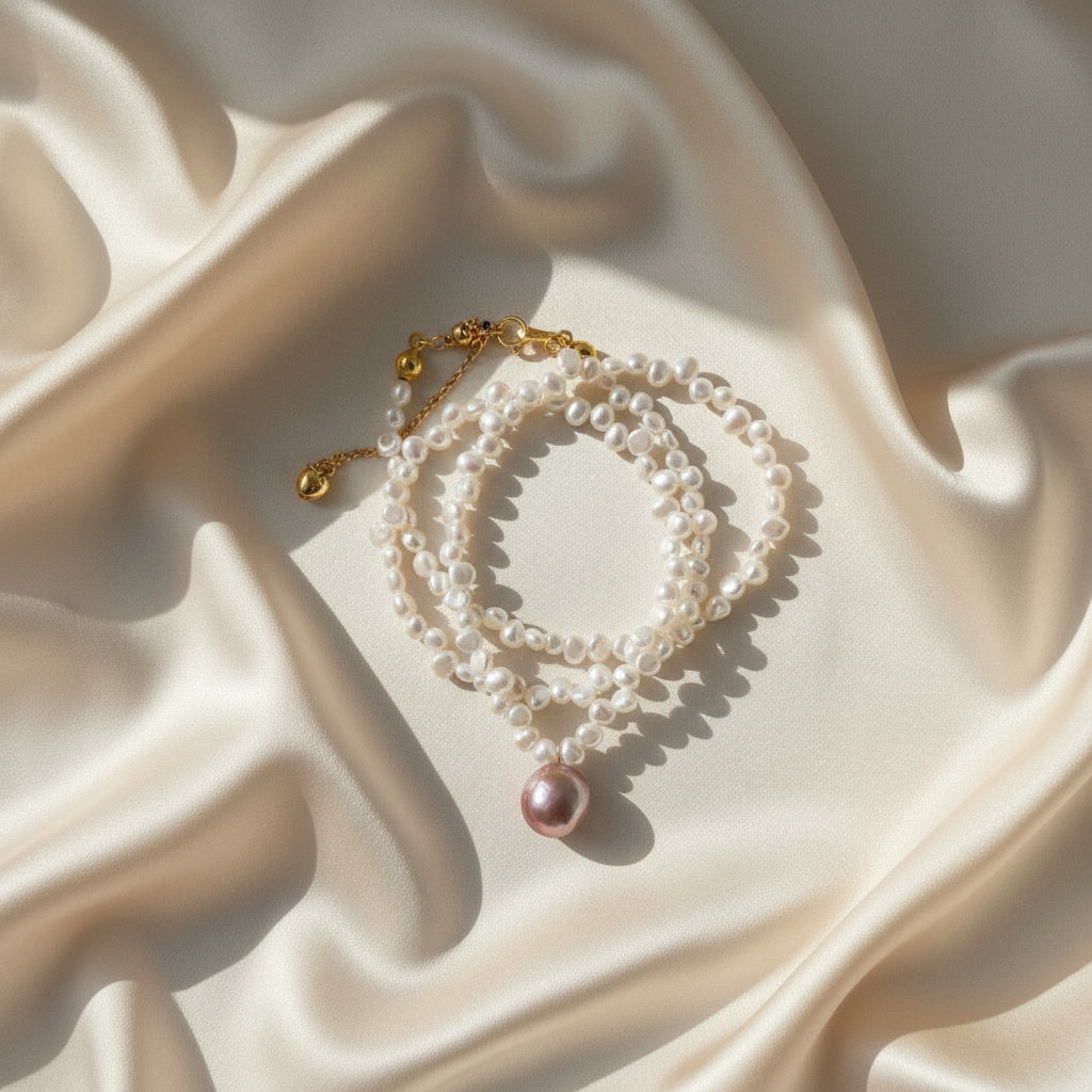 Laevié Vienna Pearl Pendant Necklace — freshwater nugget pearl strand with mauve coin-form pendant